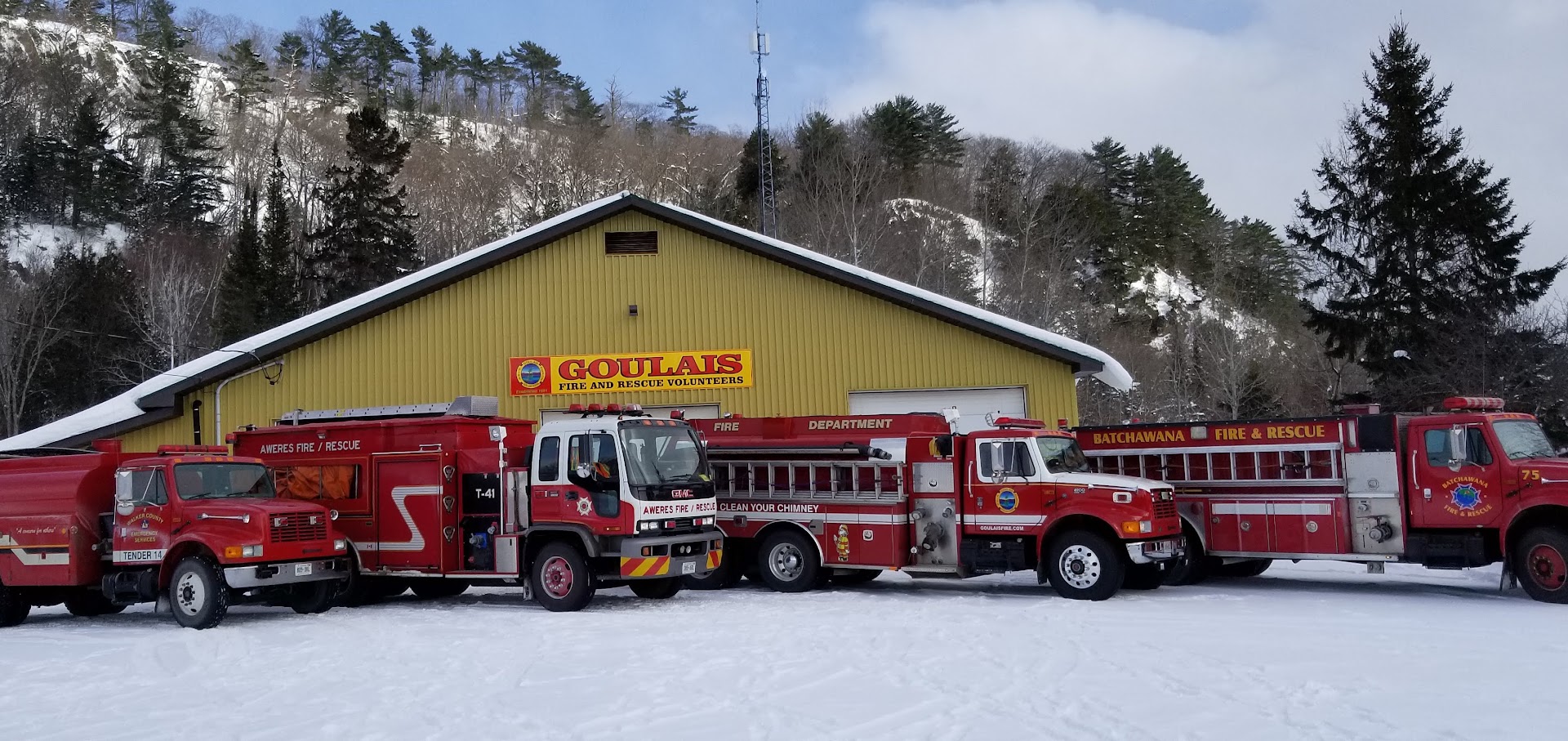Tender 14 lined up with Aweres, Goulais and Batchawana apparatus outside the Goulais fire hall in winter